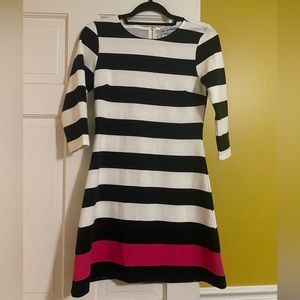 Size medium dress. Zips in back. Ribbed detail.